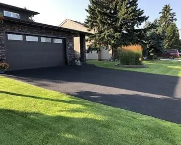 Priya's finished rubber paved driveway with clean curb appeal