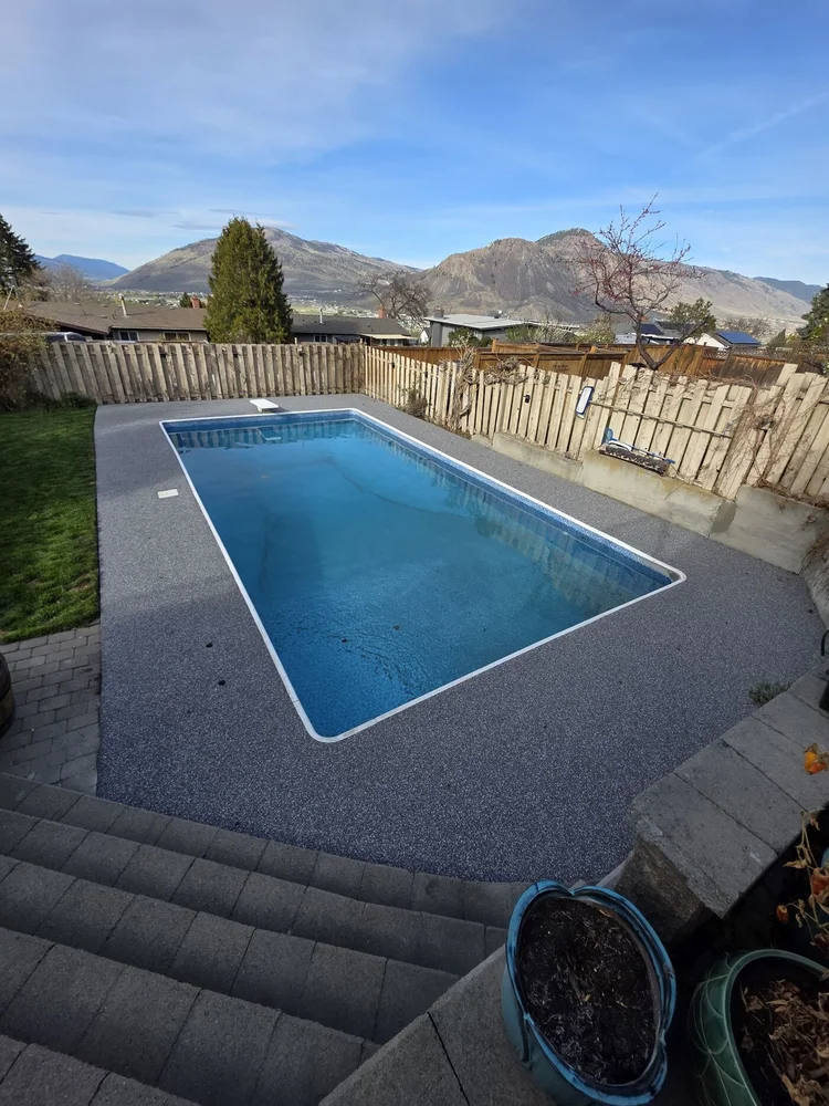 Dark rubber pool deck resurfacing