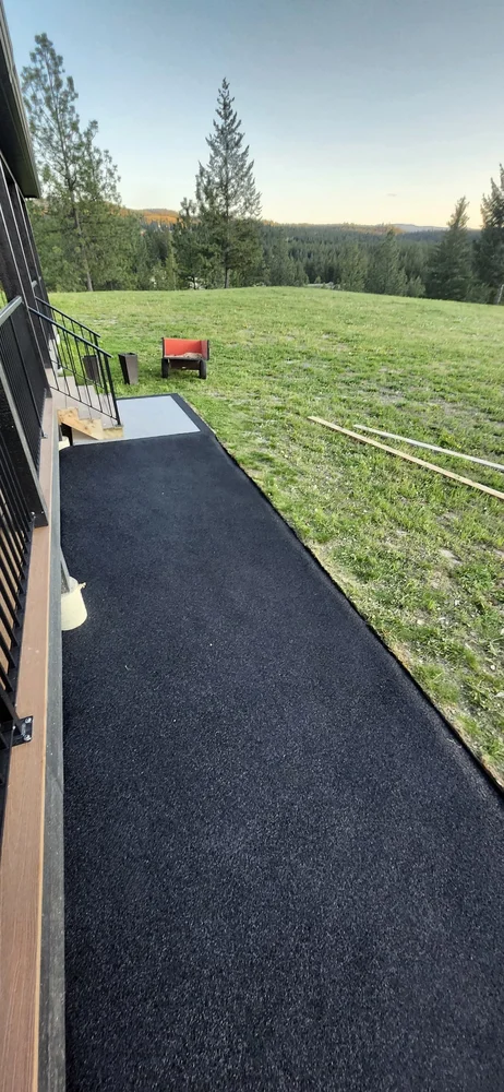 Rubber walkway alongside deck with mountain view